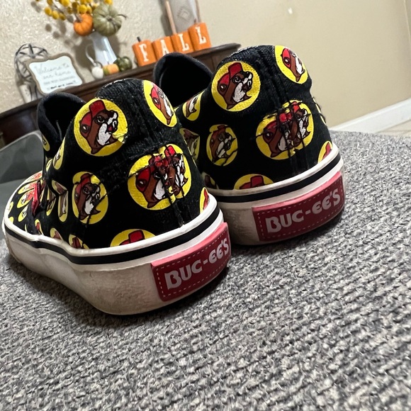 Buc-ee’s shoes repeat logos. - Picture 2 of 3